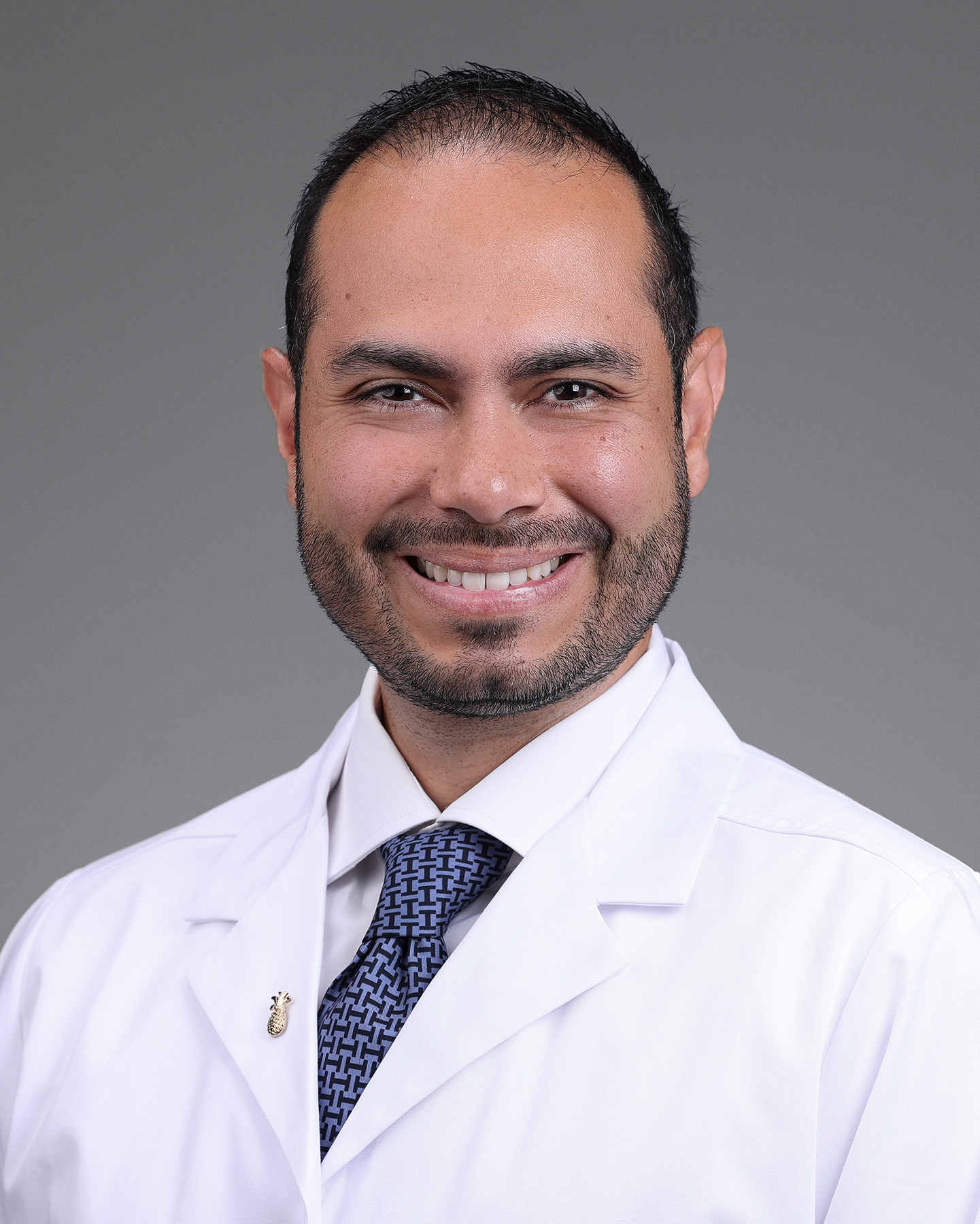 Carlos Millan, M.D., .