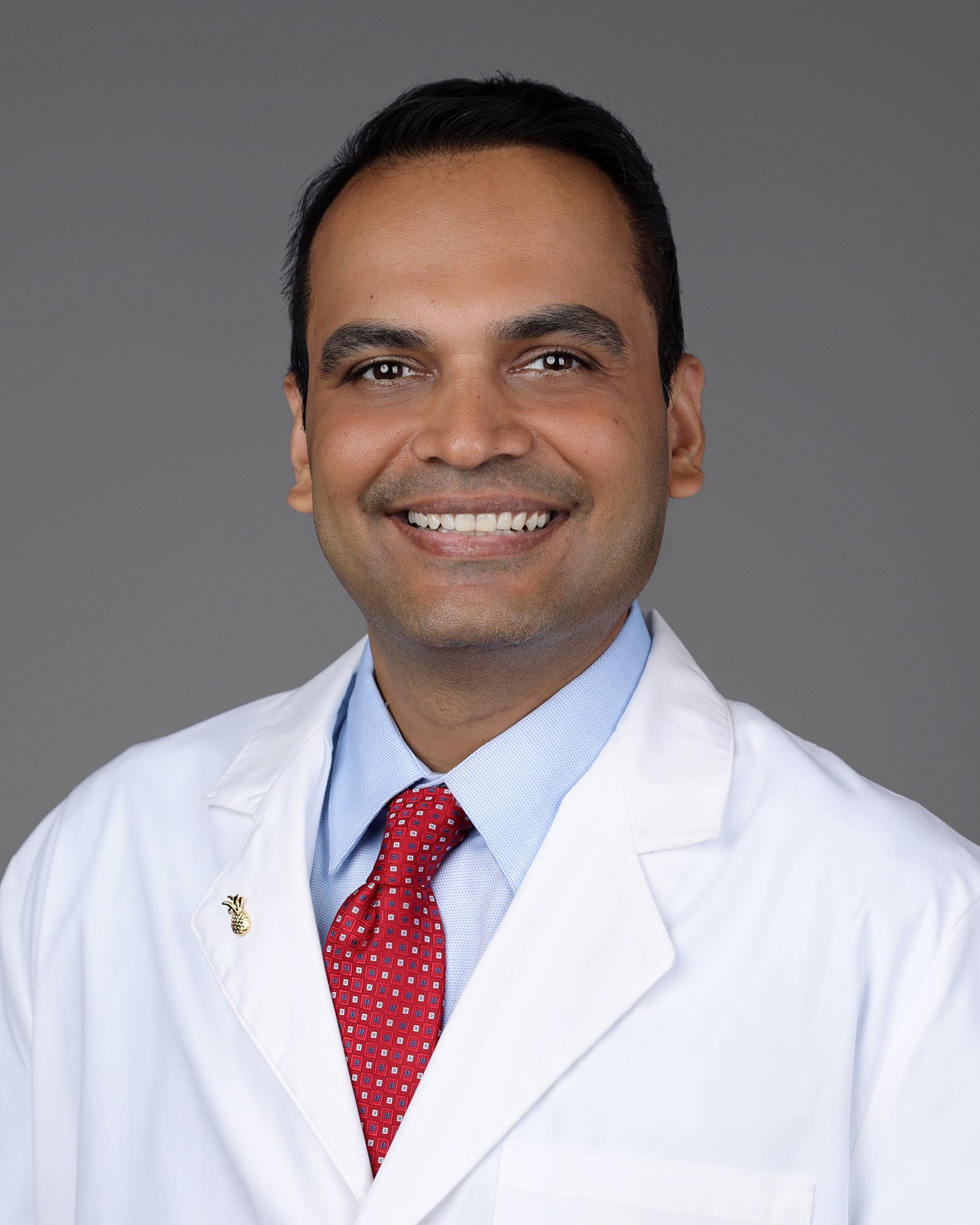 Nish Patel, M.D.,